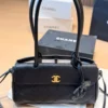 Chanel Small Calfskin Baguette Bag Style 0199