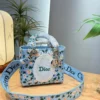 Dior Lady Dior Blue Embroidered Canvas Handbag