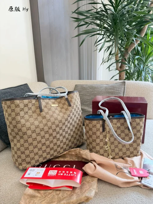 Gucci GG Supreme Monogram Leather Tote Bag