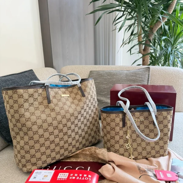 Gucci GG Supreme Monogram Leather Tote Bag