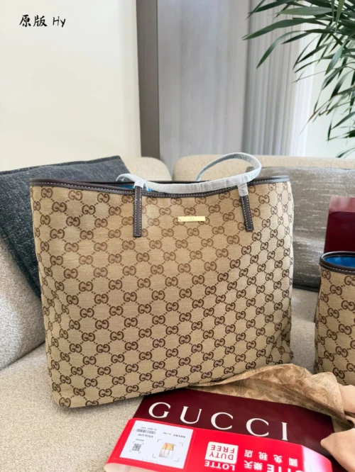 Gucci GG Supreme Monogram Leather Tote Bag