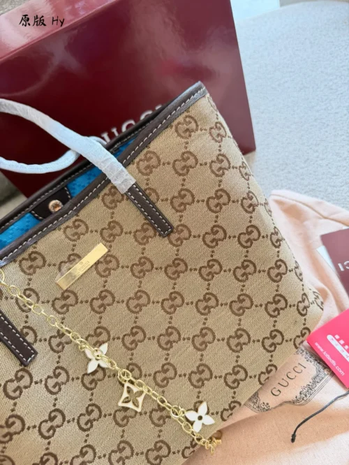 Gucci GG Supreme Monogram Leather Tote Bag