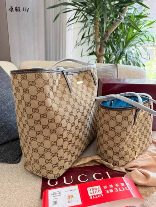 Gucci GG Supreme Monogram Leather Tote Bag
