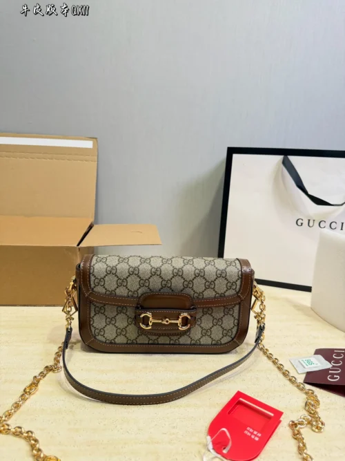 Gucci Gold Chain Baguette Bag