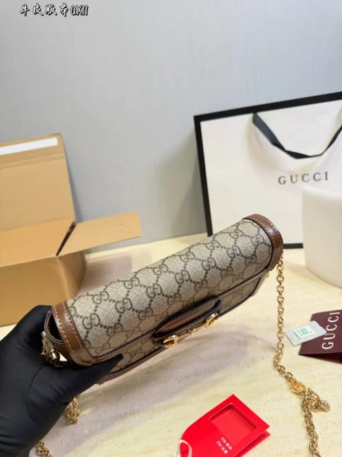 Gucci Gold Chain Baguette Bag