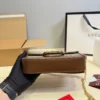 Gucci Gold Chain Baguette Bag