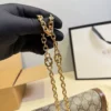 Gucci Gold Chain Baguette Bag