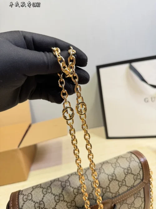 Gucci Gold Chain Baguette Bag