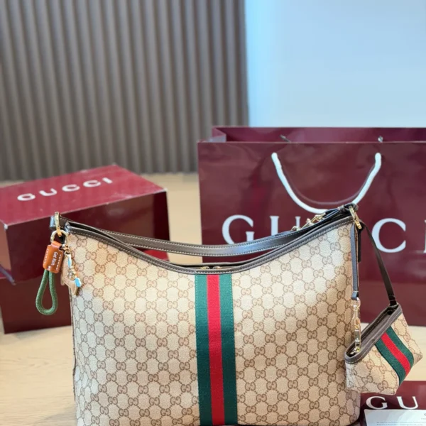 GUCCI0155-01 Gucci GG Supreme Mini Brown Monogram Leather Hobo Bag