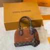 Louis Vuitton Brown Quilted Suede Bag
