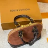 Louis Vuitton Brown Quilted Suede Bag