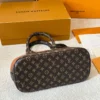 Louis Vuitton Brown Quilted Suede Bag