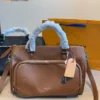 Louis Vuitton Keepall Calfskin Travel Bag