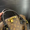 Louis Vuitton Alma Monogram Bag