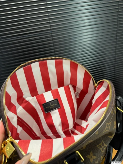 Louis Vuitton Alma Monogram Bag