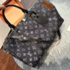Louis Vuitton Keepall Monogram Denim Travel Bag