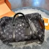 Louis Vuitton Keepall Monogram Denim Travel Bag