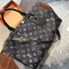 Louis Vuitton Keepall Monogram Denim Travel Bag