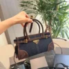 Prada Bonnie Mini Brown Calfskin Crossbody Bag