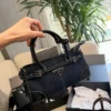 Prada Bonnie Mini Brown Calfskin Crossbody Bag