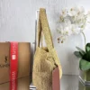 YSL Brown Woven Raffia Backpack